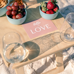 Close up of Hello with Love greeting gift card on a Deluxe 4 Glass Folding Picnic Table